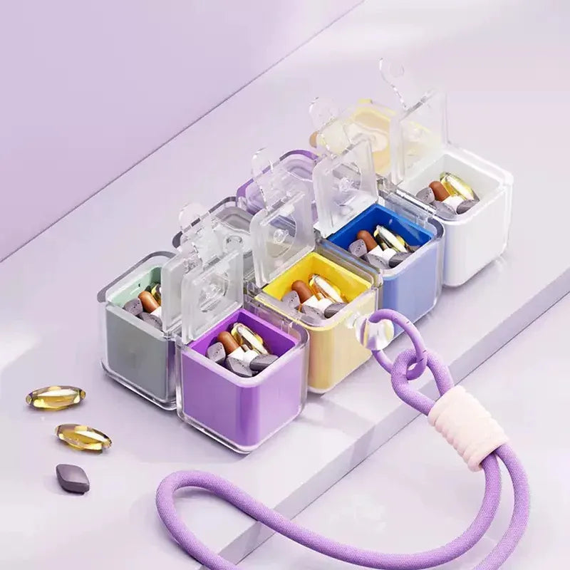 1PC Creative Magic Cube 8-Grid Medicine Storage Box, Sealed Moistureproof with Hanging Rope Travel Essential